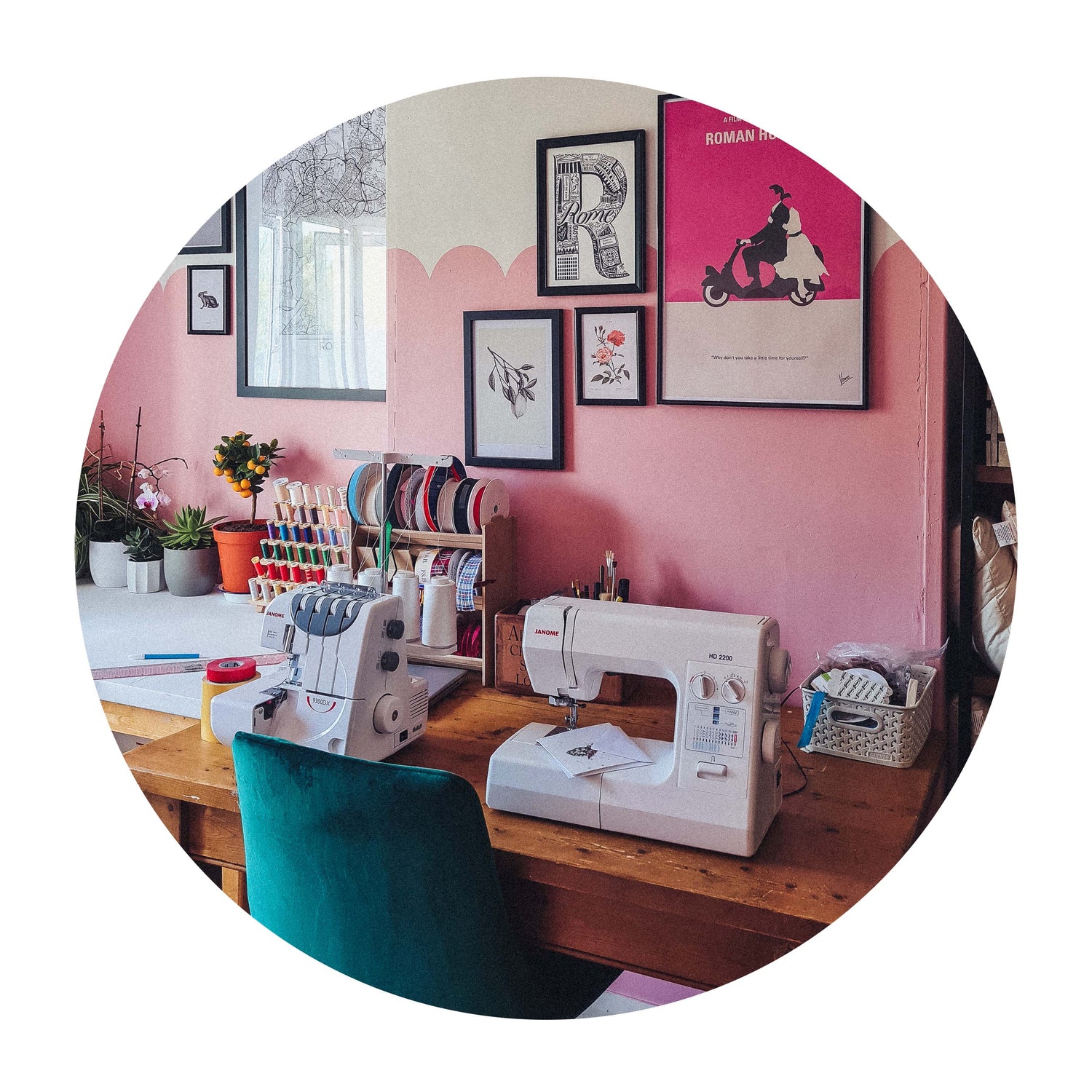 Behind the Scenes - F&B Crafts Sewing Room - Featuring pink scalloped walls, italian themed posters, janome machines and an emerald chair