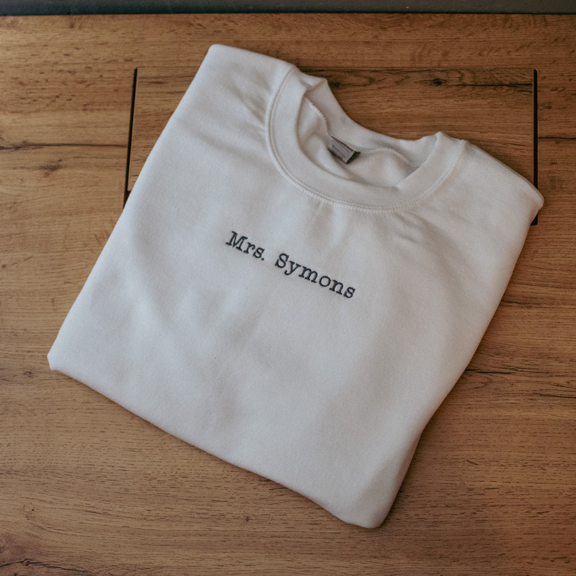 White sweatshirt with grey name embroidered - F&B Crafts