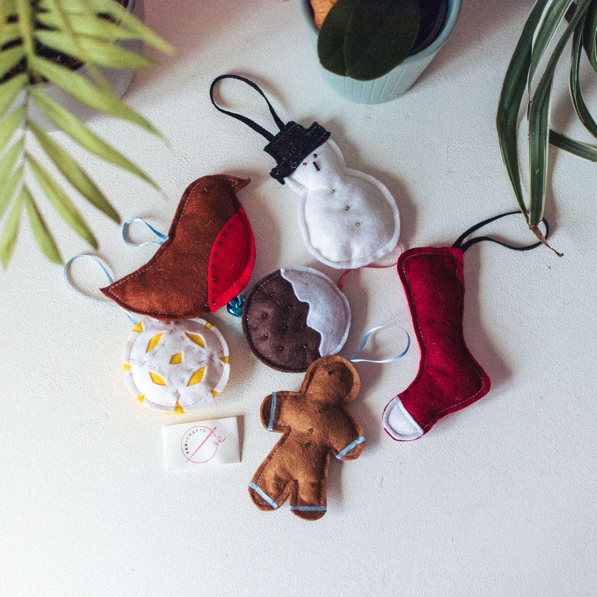 Gingerbread Man Ornament: A handmade gingerbread man felt ornament, perfect for holiday decor.
