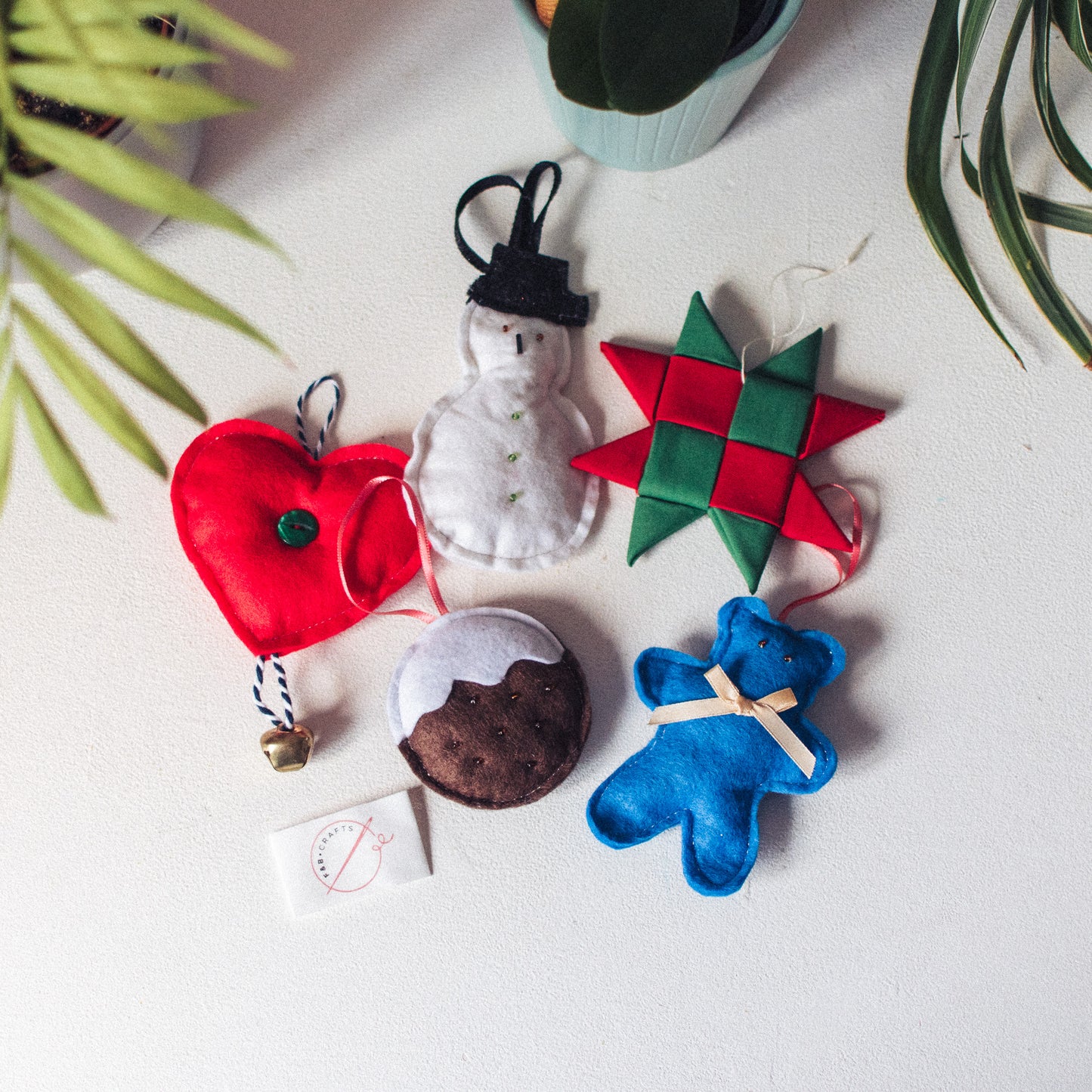 Versatile Holiday Decorations: Assorted felt ornaments for decorating your tree or home, creating a cozy and festive atmosphere.