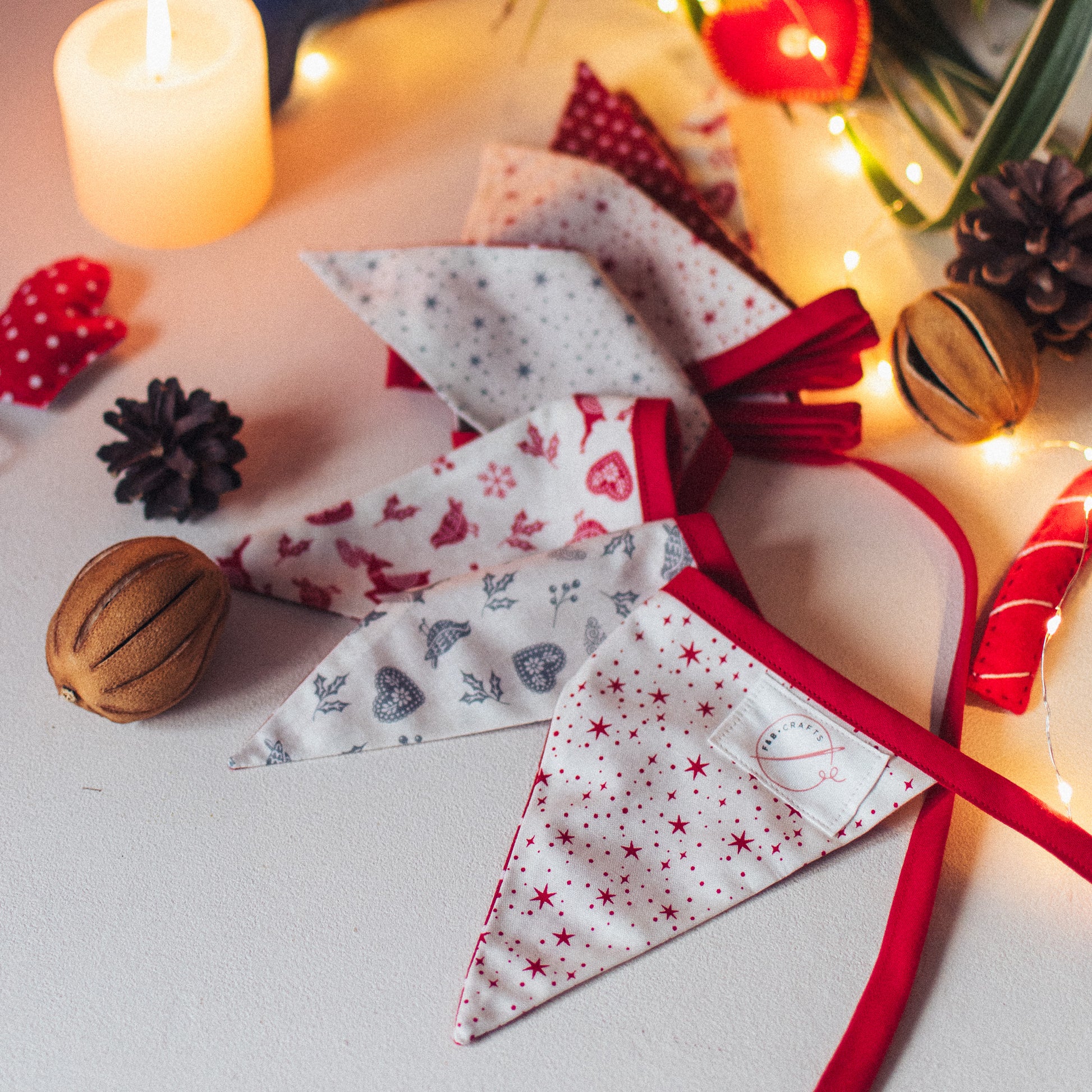 Festive Christmas Bunting Featuring red and grey stars and reindeer in scandi style fabric by F&B Crafts